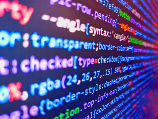 Abstract computer script code. Blue color. Data encryption security code on a computer display....