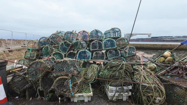Lobster pots at St Andrews harbour in Scotland.