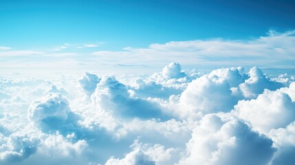 Naklejka premium White Fluffy Clouds in a Blue Sky Viewed from Above