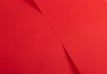Elegant red scarlet paper background with a smooth texture and vibrant gradient. Featuring a rich