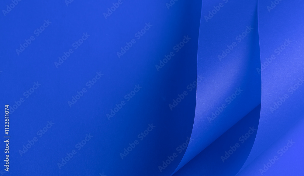 Poster elegant royal blue paper background with a rich matte texture and subtle wavy folds. vibrant deep