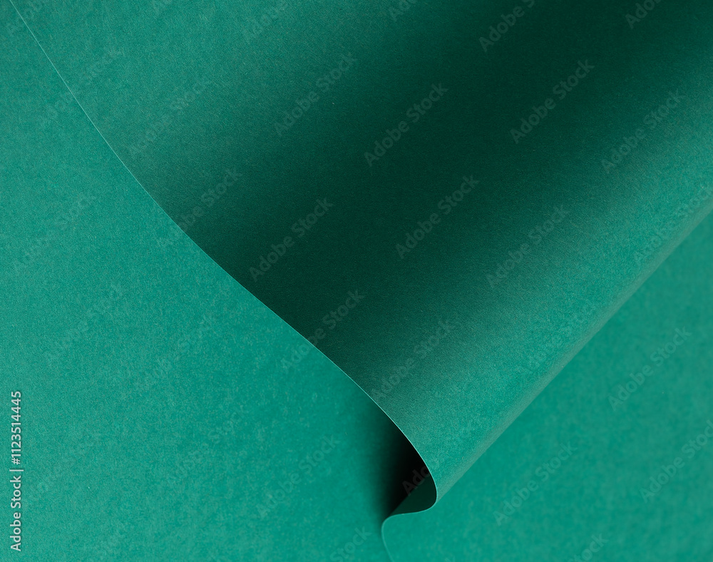 Leinwandbilder Emerald green paper background with a matte finish and subtle wavy texture. Deep green tones create