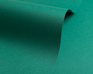 Emerald green paper background with a matte finish and subtle wavy texture. Rich and bold design,