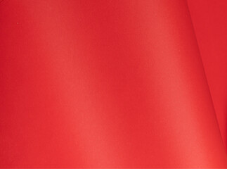 Premium scarlet red paper background with a rich gradient and fine texture. Elegant monochrome