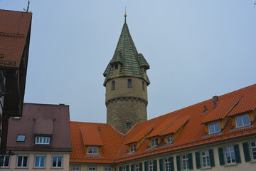 Fototapeta premium Historic Tower and Colorful Rooftops in a European Town