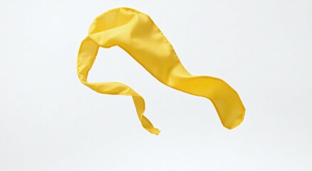 A golden yellow fabric twisting and curling in mid-air, ideal for luxury branding, art design, or digital compositions.