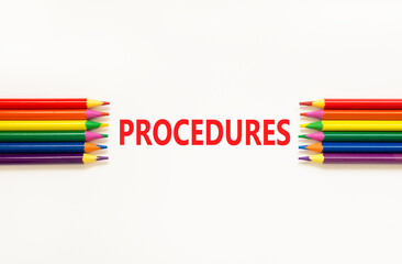 Procedures symbol. Concept word Procedures on beautiful white paper. Beautiful white paper background. Beautiful colored pencils. Business procedures concept. Copy space.
