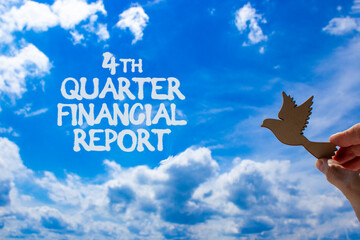 4th quarter financial report symbol. Concept words 4th quarter financial report. Beautiful blue sky...
