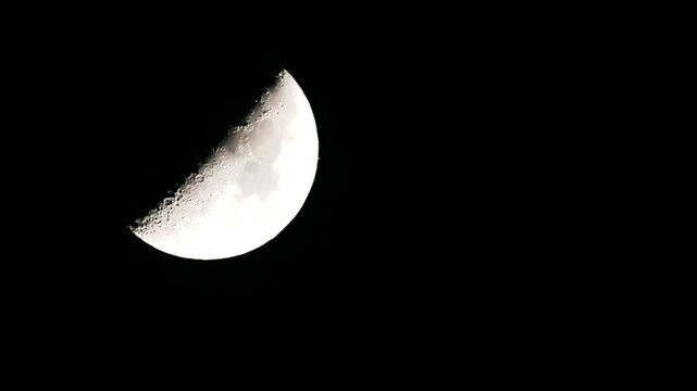 Tokyo,Japan - December 8,  2024: Saturn emerging from the Moon in lunar occultation observed in Tokyo at 19:00 on December 8, 2024.