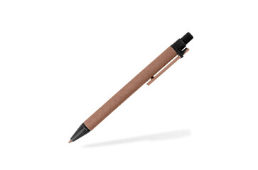 Carboard eco brown ballpoint pen flying isolated on white. Disposable paper ball pen with shadow.