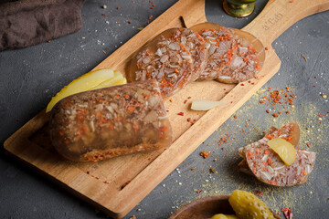 Meat homemade delicacies on dark wooden table