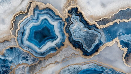 Minimalist abstract blue agate geode is captured from above, with intricate patterns and a gold foil finish. The photograph highlights smooth textures and sharp details.