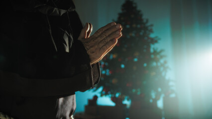 Christian Religious Praying Hands Silhouette In Front Of Christmas Tree