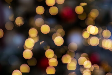 Fototapeta premium A softly blurred image showcasing beautiful Christmas lights adorning a tree