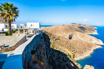 Rock cliffs on sea coast near Chora village, Folegandros island, Cyclades, Greece