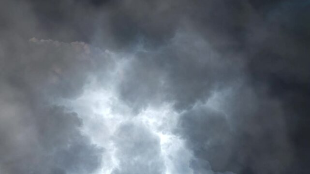 4K Lighting bolts on the dark clouds and night sky.