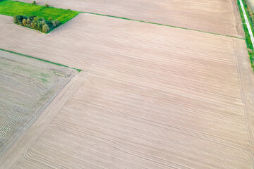 Aerial photo made with drone of plowed agriculture fields