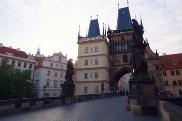 Obraz premium The sunrise over Charles Bridge in Prague, Czech Republic, is picturesque