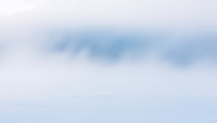 Obraz premium Misty landscape with barely visible trees and water