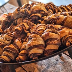Bakery products - fresh Chocolate filled croissants on a bakery