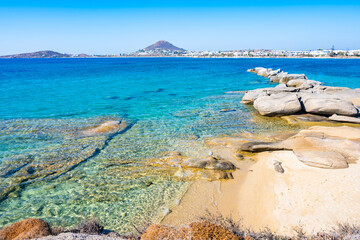 View of rocks in sea on sandy Agia Anna beach, Naxos island, Cyclades, Greece