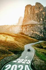 2025 New Year road trip travel and future vision concept . Nature landscape with highway road...