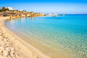 Idyllic sandy beach of Orkos bay and calm crystal clear azure sea water, Naxos island, Cyclades, Greece