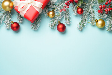 Christmas flat lay background. Red and gold christmas ornament with space for design.