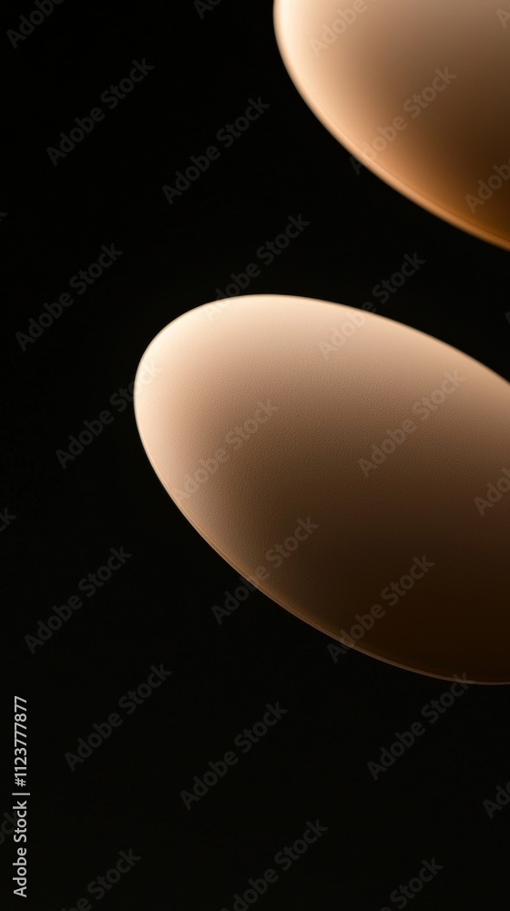 Poster two illuminated ovals are partially visible against a dark backdrop, creating a gradient effect as l