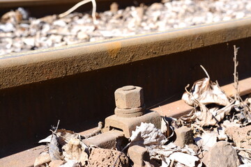 Metal train track in a industrial area