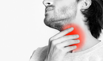 Throat pain. Man holding inflamed spot, panorama, free space