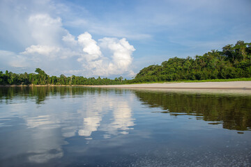 IGAPOS OF THE NANAY RIVER, BLACK WATERS THAT REFLECT THE CLOUDS ON THEIR SURFACE