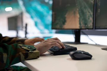 Military power base under ruling of army IT professional who analyzes registered data about a new...