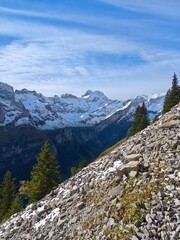 Swiss alp mountains snowed during a sunny autumn day