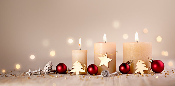 Christmas Background - Advent Candles, Greeting Card,  3. Advent  decoration with star and tree, red balls on light rustic wood, friendly warm Xmas backdrop with copy space, banner,  header, panorama 
