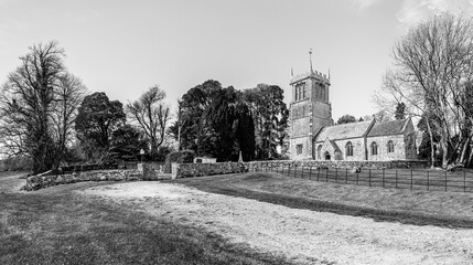 Lulworth, Dorset, England, UK: Traditional english abbey on the grounds at Lulworth Castle Wareham in black and white