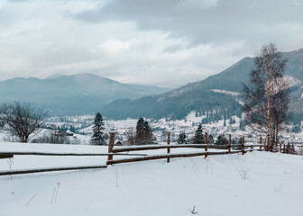 Daybreak winter Carpathian mountain village Zelene, Verkhovyna, Ukraine