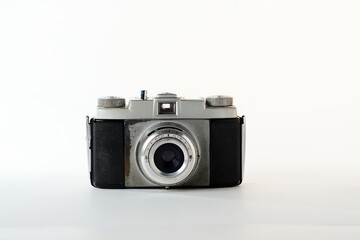 Vintage camera displayed on a neutral background for artistic photography
