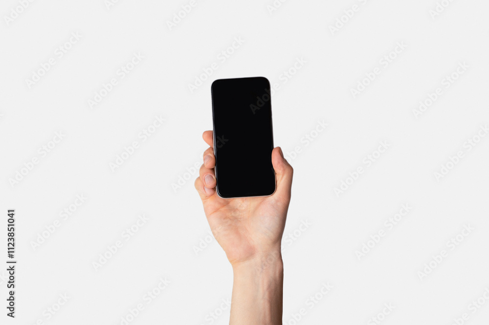 Poster male hand showing smartphone with empty screen over light background, mockup for mobile app design