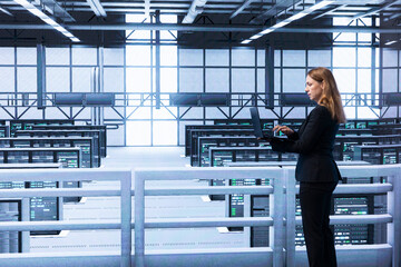 Engineer in data center checking rigs and infrastructure, doing maintenance. IT expert planning and...