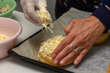 Crafting delicious savory pastries with cheese and care in a cozy kitchen setting