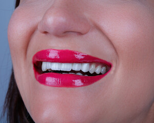 Naklejka premium close up of lips with red lipstick
