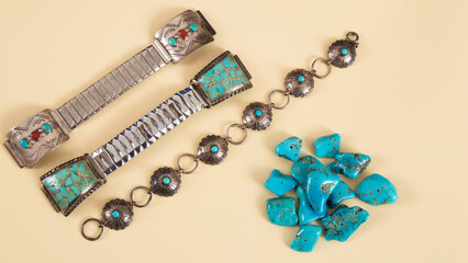 Old silver bracelets with blue American turquoise close up.  Isolated jewelry with turquoise flat lay. Indian Navajo craftsmanship. Southwest amulet.