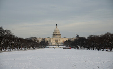 U.S. Capitol Building in Winter: Snow-Covered National Mall Scene in Washington D.C.