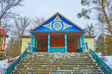 The carved wooden facade of historic village school building, Pereiaslav Scansen, Ukraine
