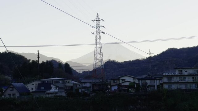 Mount Fuji Skyline from Otsuki: A Serene Scene
A serene view of Mount Fuji as it graces the Otsuki skyline, surrounded by nature.