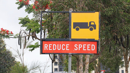 Reduce Speed Road Sign