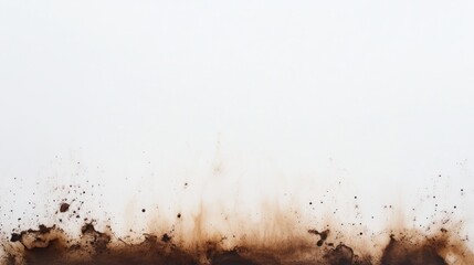 Obraz premium Abstract artwork featuring brown ink splashes against a white background.