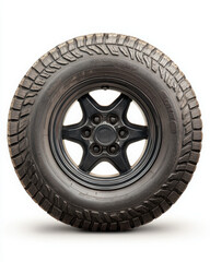 Obraz premium Close-up of a rugged black tire with deep tread patterns.