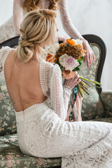 Bride and bridesmaids in studio,